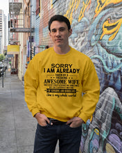 Load image into Gallery viewer, I Am Already Taken By A Freaking Awesome Wife Sweatshirt