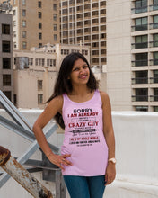 Load image into Gallery viewer, I'm Already Taken By A Freaking Crazy Guy Ladies Flowy Tank