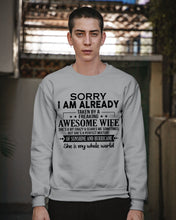 Load image into Gallery viewer, I Am Already Taken By A Freaking Awesome Wife Sweatshirt