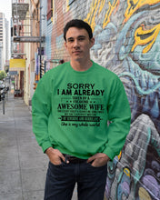 Load image into Gallery viewer, I Am Already Taken By A Freaking Awesome Wife Sweatshirt