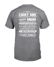 Load image into Gallery viewer, Lucky Son Who Raised By A Freaking Awesome April Mom Guys Tee