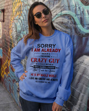 Load image into Gallery viewer, I'm Already Taken By A Freaking Crazy Guy Sweatshirt
