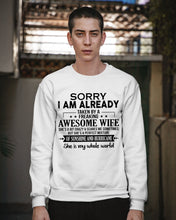 Load image into Gallery viewer, I Am Already Taken By A Freaking Awesome Wife Sweatshirt

