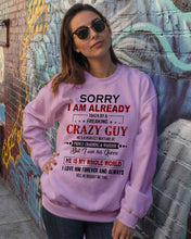 Load image into Gallery viewer, I'm Already Taken By A Freaking Crazy Guy Sweatshirt
