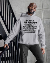 Load image into Gallery viewer, I Am Already Taken By A Freaking Awesome Wife Hoodie
