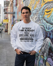 Load image into Gallery viewer, I Am Already Taken By A Freaking Awesome Wife Sweatshirt
