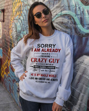 Load image into Gallery viewer, I'm Already Taken By A Freaking Crazy Guy Sweatshirt
