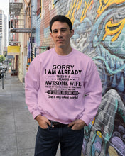 Load image into Gallery viewer, I Am Already Taken By A Freaking Awesome Wife Sweatshirt

