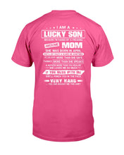 Load image into Gallery viewer, Lucky Son Who Raised By A Freaking Awesome April Mom Guys Tee
